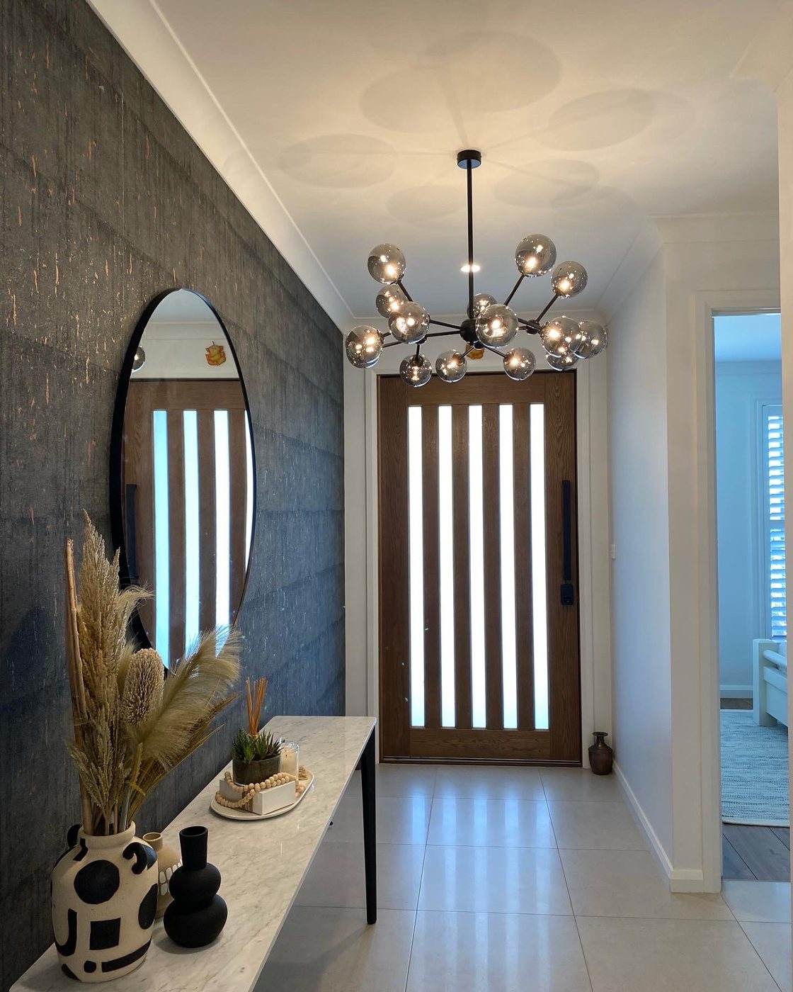 Feature Chandelier Installation by Wombat Power Services